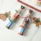 Glitzhome® 10" Christmas Nutcracker Party Cracker with Gift Contents, 8ct.